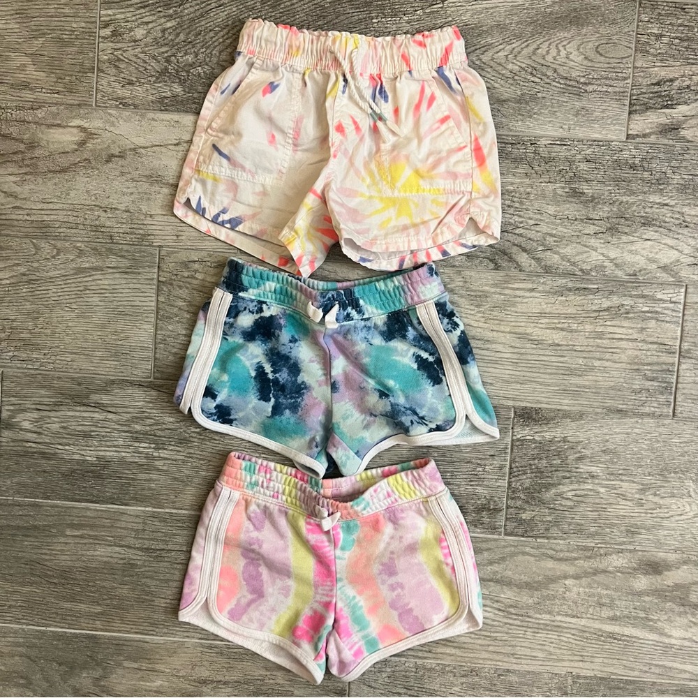 Like new! 3 pairs of size small muti-colored shorts.